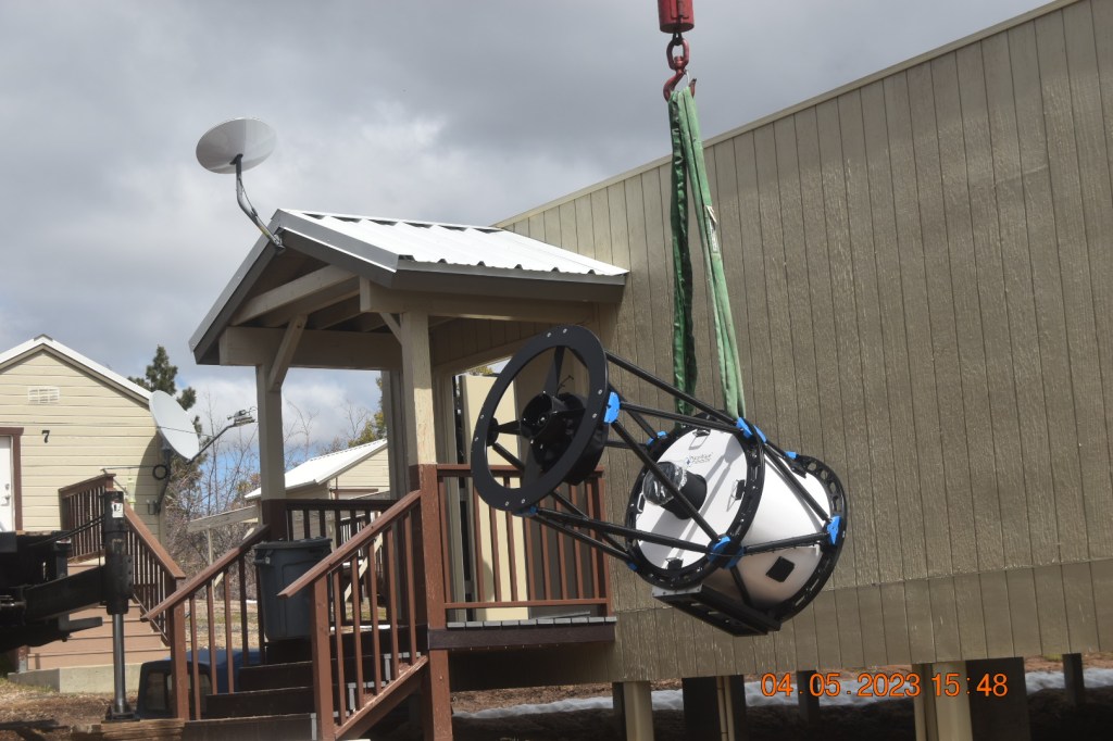 The telescope getting closer to its pier